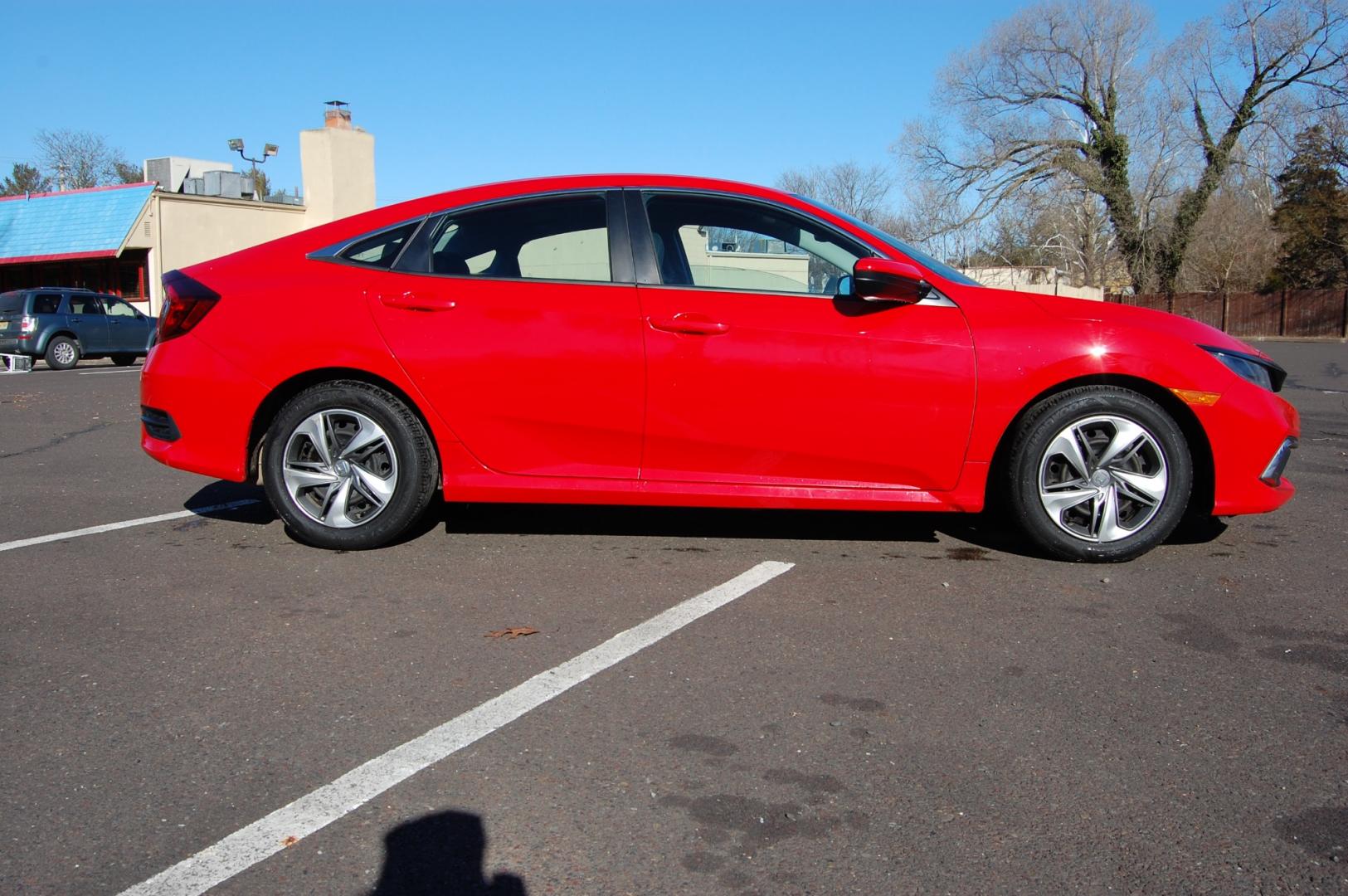 2019 RED /Black Cloth Honda Civic (2HGFC2F60KH) with an 2.0 Liter engine, Automatic transmission, located at 6528 Lower York Road, New Hope, PA, 18938, (215) 862-9555, 40.358707, -74.977882 - One family owned 2019 Honda Civic LX sedan powered by a 2.0 Liter 4 cylinder engine, front wheel drive, automatic transmission. Tilt wheel, cruise control, Dual front and side air bags, Side curtains airbags, ABS braking, AM/FM/Bluetooth/USB, Auto climate control, power windows, locks and mirrors, 1 - Photo#3